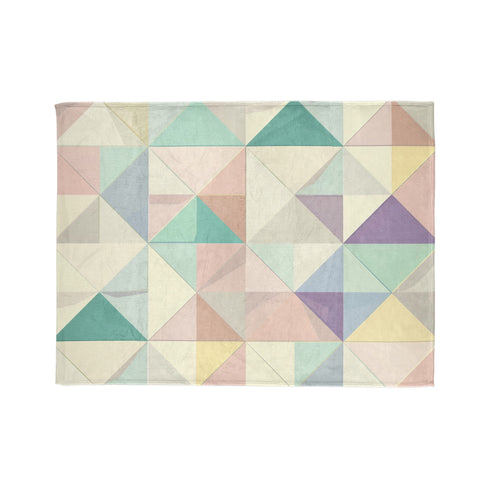 Pastel geometry blanket featuring luxurious comfort inspired by Lotte New York Palace.