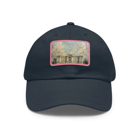 White cotton Buckingham Palace watercolor hat with light brown patch.