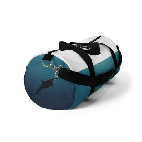 Ocean whale duffel bag with serene whale swimming in ocean design.
