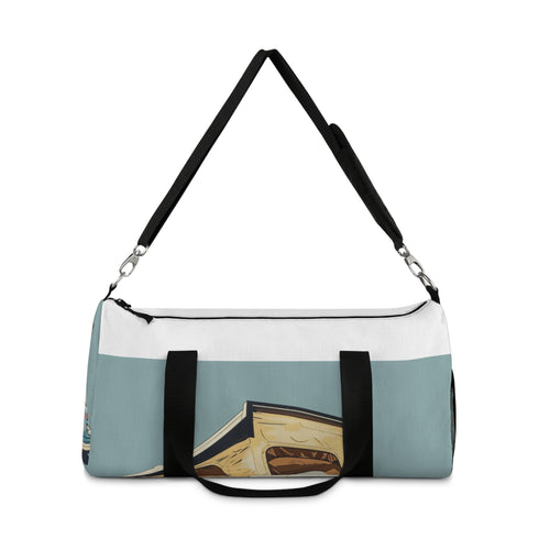 Light blue retro camper duffel bag for weekend getaways.