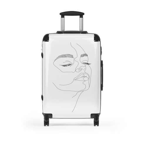 Chic minimalist black small suitcase with face-inspired design for travel.