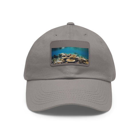White cotton baseball cap featuring colorful coral reef design, rectangle patch.