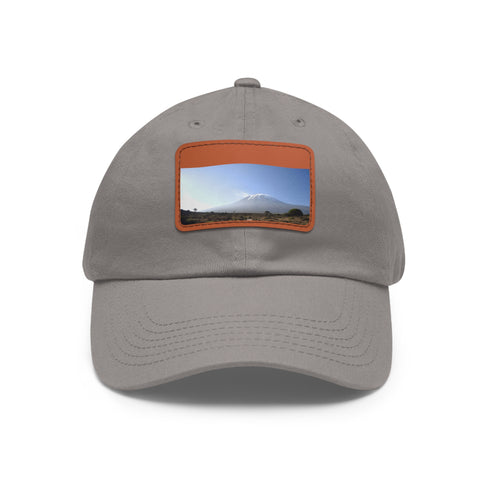 Mount Kilimanjaro summit cotton hat in white with light brown patch.