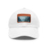 White cotton baseball cap with mystic horizon landscape design.