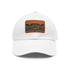Aztec warrior baseball cap, white with light brown rectangle patch.
