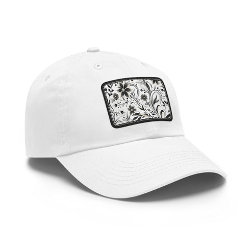 Monochrome baseball cap with repeating pattern design in black and white.