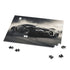Bugatti sports car jigsaw puzzle with high-speed racing theme.