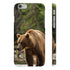 Alt text: Alaskan Wilderness Phone Case featuring a majestic brown bear in its natural habitat, embodying the untamed spirit of Alaska. High-quality, versatile, and stylish design perfect for all seasons. Makes a great gift. Shop more designs at printswithpassion.com