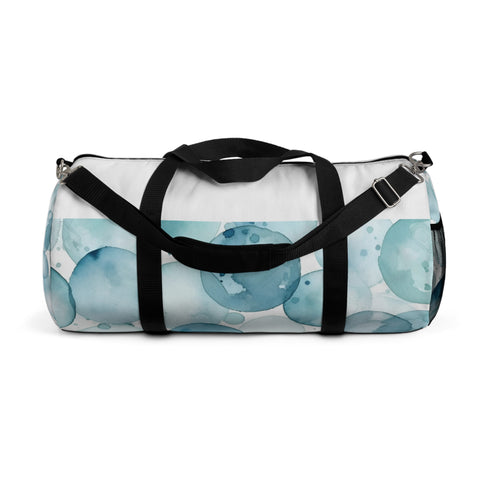Eye-catching blue water duffel bag with mesmerizing watercolor eyes pattern.