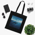Minimalist black cotton tote bag with whale design, perfect for ocean-lovers.