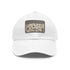 Botanical baseball cap with intricate pattern in white and light brown.