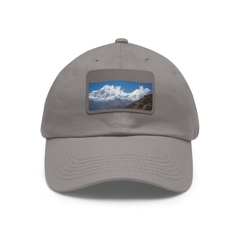 Annapurna Adventure Trek Cap with white/light brown patch, unisex accessory.