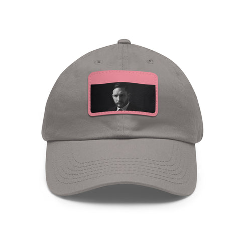 Stylish white cotton baseball hat with light brown patch.