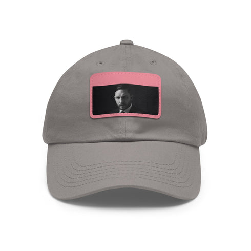 Stylish white cotton baseball hat with light brown patch and rectangle shape.