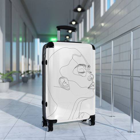 Chic minimalist black face suitcase for travel accessories, small size.