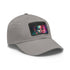 Neon watercolor charm baseball cap in white with light brown patch.