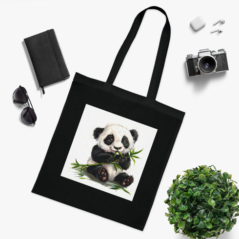 Adorable black cotton tote featuring panda with bamboo snack.
