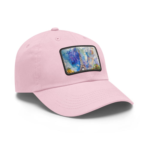 White cotton baseball cap with Eiffel Tower watercolor print.