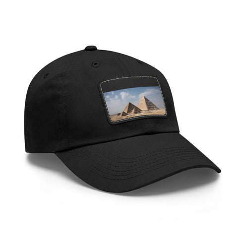 White baseball cap with light brown patch in rectangle shape.