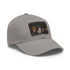 George Clooney white baseball cap with light brown rectangle patch.
