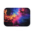 Neon galaxy bath mat with swirling stars and vibrant colors.