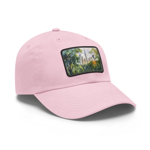 Central Park skyline watercolor baseball cap in white with light brown patch.
