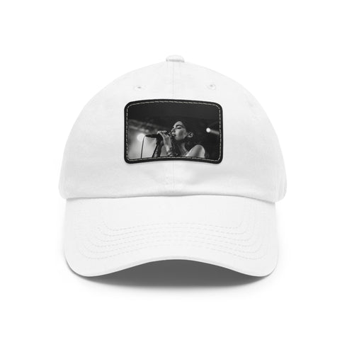 White cotton Dua Lipa Melody snapback hat with light brown patch.