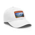 Alpine Peak Adventure Cap in White with Light Brown Patch.