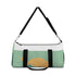 Minimalist mountain landscape print duffel bag for weekend getaways.