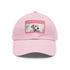 Dalmatian design white baseball cap with light brown patch.