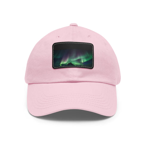Northern Lights embroidered white baseball cap with brown patch.