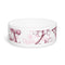 Pink and white ceramic pet bowl with cherry blossom pattern.
