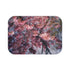 Pink cherry blossom bath mat with serene Japanese garden design.