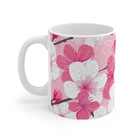 Elegant pink and white ceramic cherry blossom coffee mug.