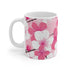 Elegant pink and white ceramic cherry blossom coffee mug.