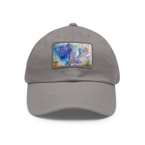 Eiffel Tower watercolor baseball cap with light brown rectangle patch.