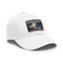 Night-inspired London baseball cap in white with light brown rectangle patch.