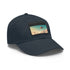 Futuristic city skyline baseball cap in white with brown patch.