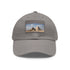 Stylish white baseball cap with light brown rectangular patch.
