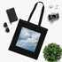 Ethereal black cotton tote bag with captivating design inspired by wallpaper patterns.