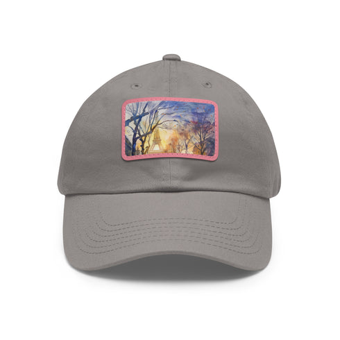 Eiffel Tower watercolor baseball cap with light brown patch.