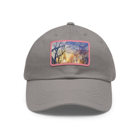 Watercolor Eiffel Tower baseball cap with light brown rectangle patch.