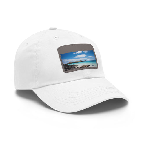 Galapagos Explorer white cotton baseball cap with light brown patch.