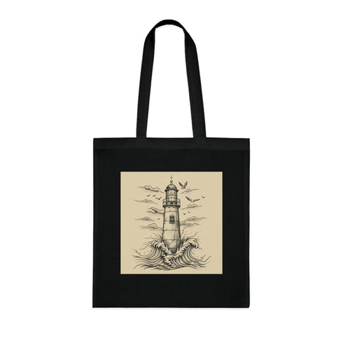 Black cotton tote bag with hand-drawn lighthouse against crashing waves.
