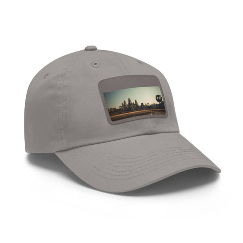 Angkor Wat inspired unisex cotton baseball cap with light brown patch.
