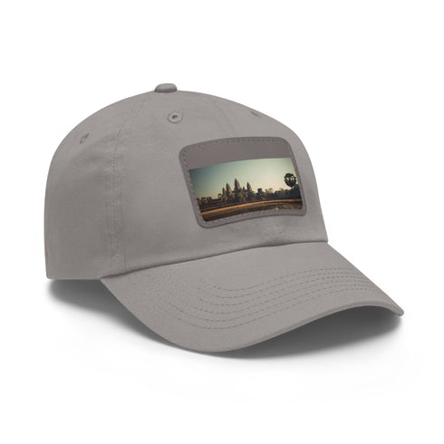 Stylish white cotton baseball cap with Angkor Wat-inspired patch.