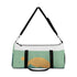 Mountain landscape print small duffel bag for weekend getaways.