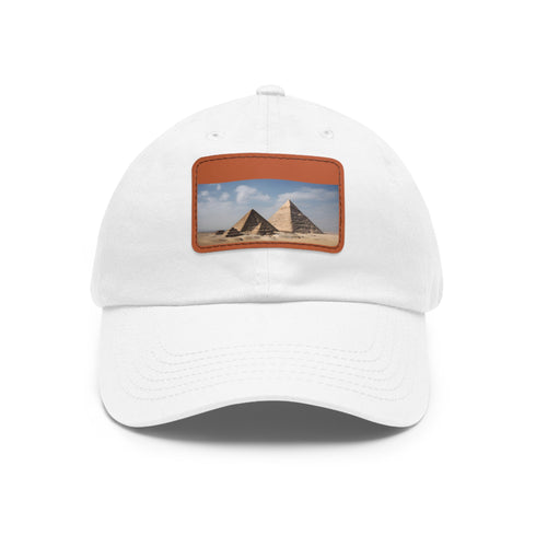 White cotton baseball cap with light brown rectangle patch.