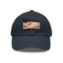Autumn foliage patterned baseball cap in white with light brown rectangle patch.