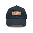 Autumn-themed white baseball cap with leaf pattern and light brown patch.